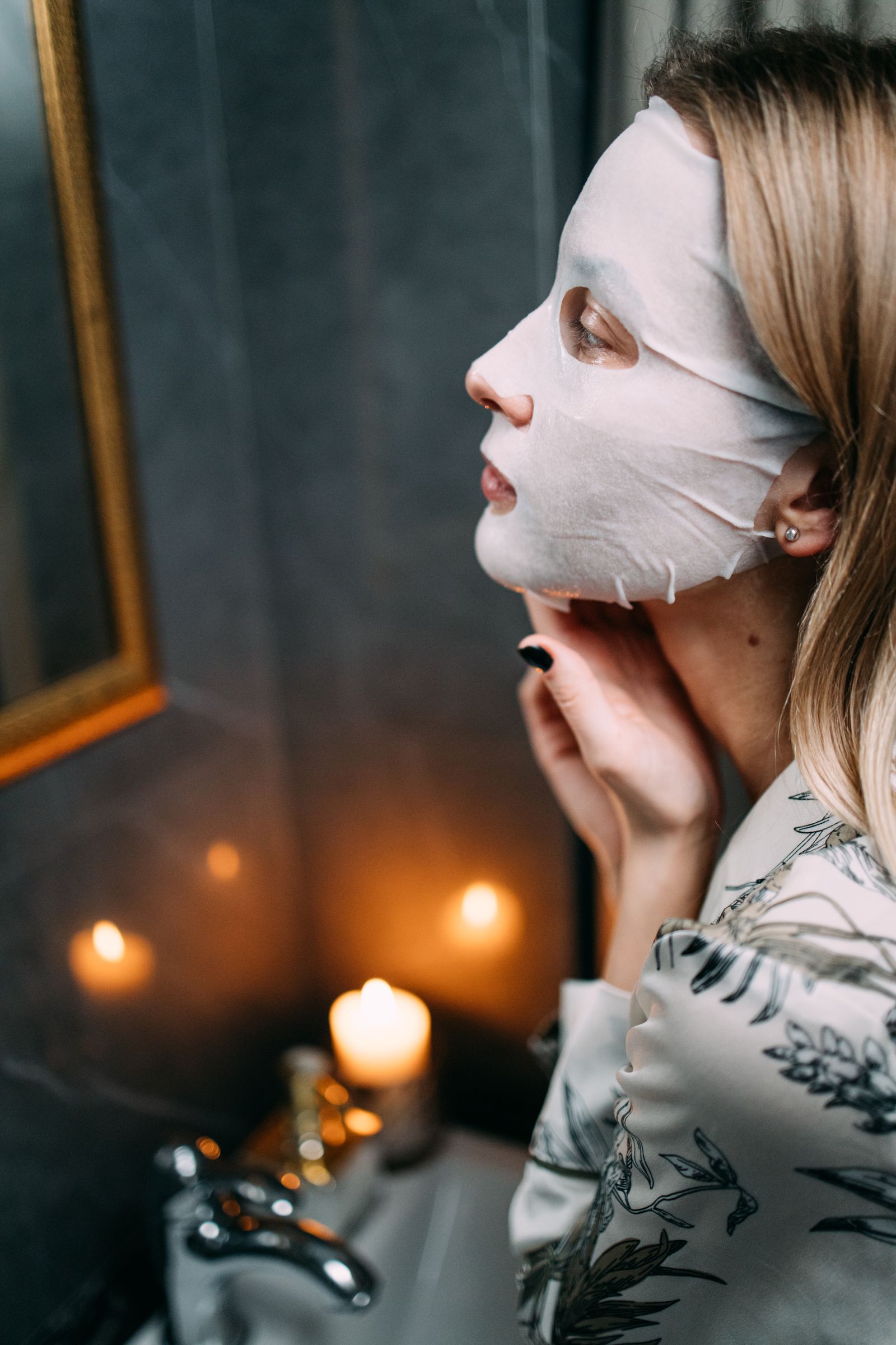 Guest relaxing in a sheet mask